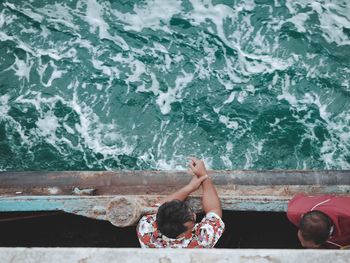 High angle view of people in swimming pool