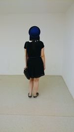 Rear view of woman wearing hat