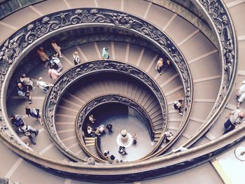 High angle view of people on spiral staircase