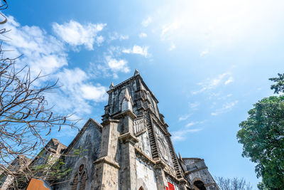 Low angle view of traditional building against sky