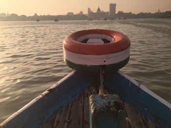 Close-up of ship in sea against sky