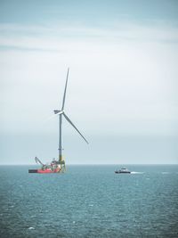 Ship in sea against sky