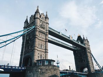 Low angle view of tower bridge against sky