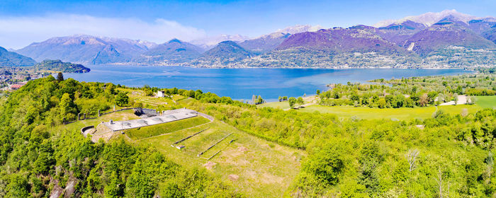 Scenic view of landscape and mountains against sky