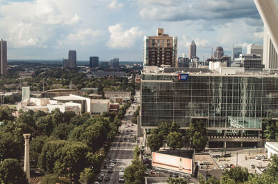 High angle view of buildings in city against sky