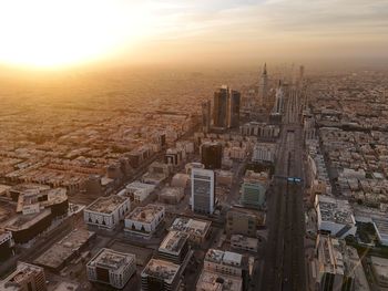 High angle view of cityscape against sky during sunset