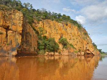 Scenic view of rock formations against sky