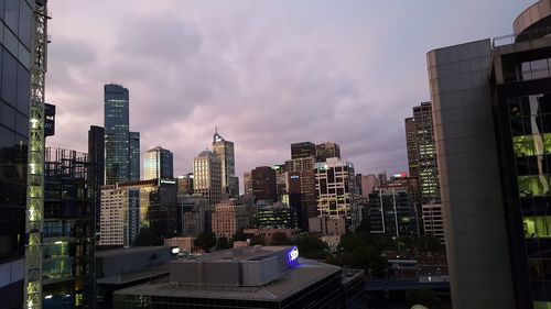 Low angle view of city against sky