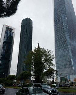 Low angle view of skyscrapers against sky