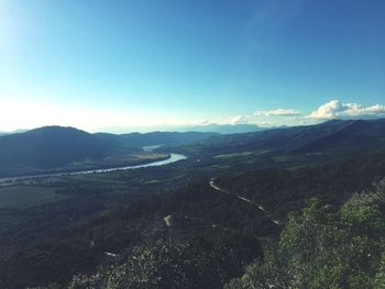 Scenic view of mountains against clear blue sky