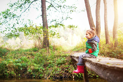 Full length of boy in forest