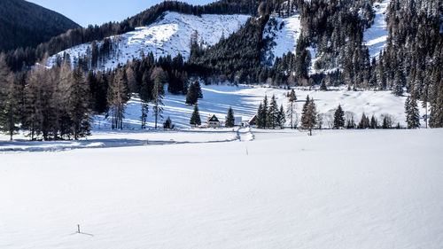 Scenic view of snow covered landscape and mountains