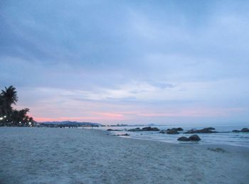 Scenic view of sea against sky at sunset