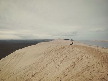 Scenic view of desert against sky