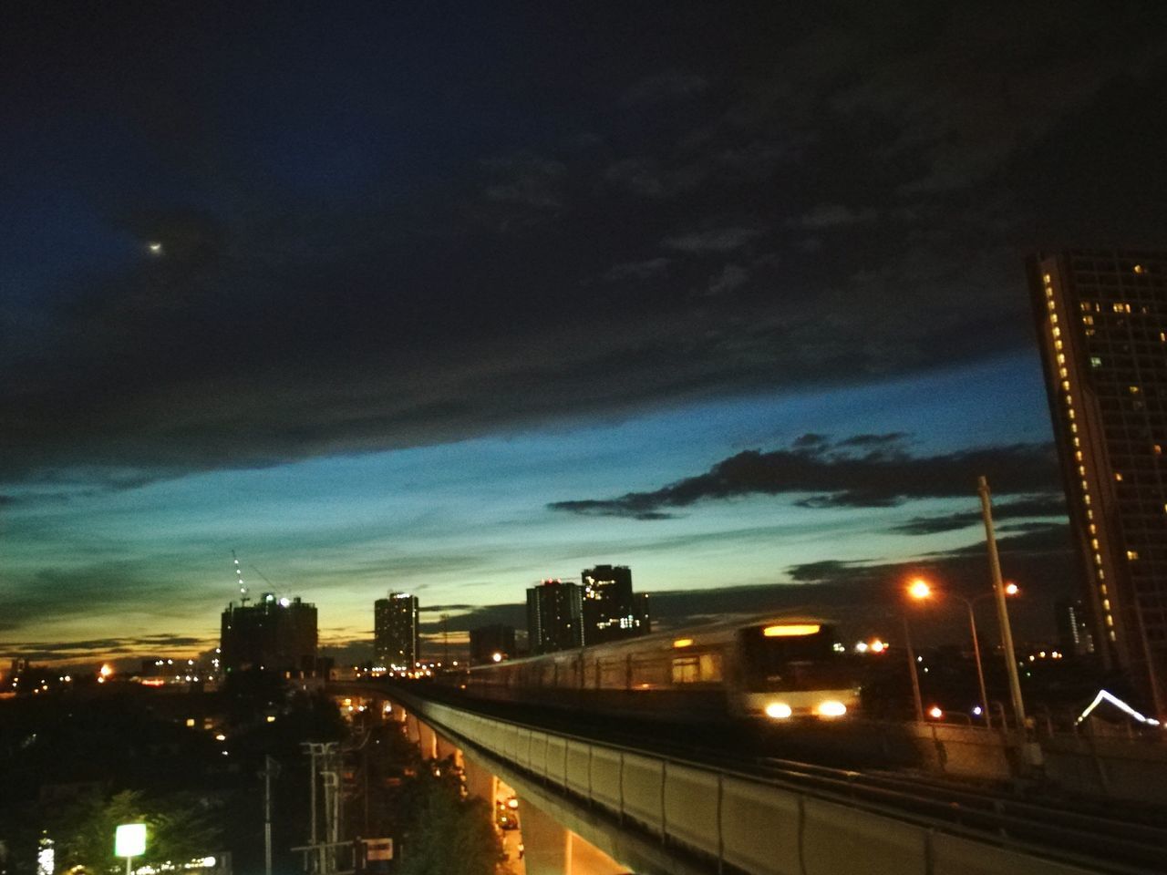 ILLUMINATED CITY AT NIGHT