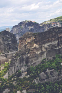 Scenic view of cliff against sky