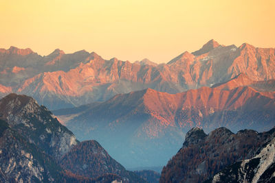 Scenic view of mountains against sky during sunset