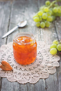 Close-up of orange juice in glass on table