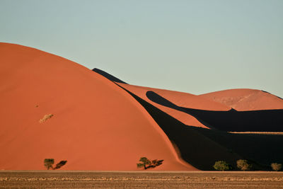 Scenic view of desert against clear sky