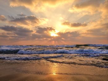 Scenic view of sea at sunset