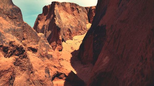 Scenic view of rocky mountains against sky