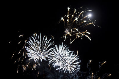 Firework display at night