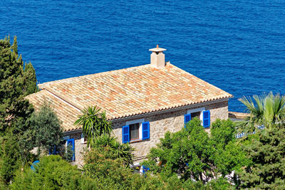 High angle view of building by sea