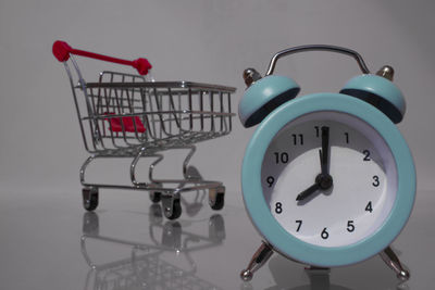 Close-up of clock against wall