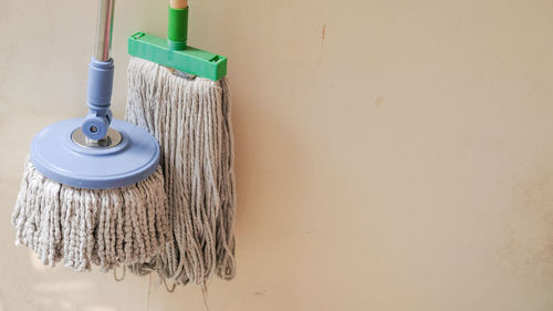 Close-up of clothes hanging on wall