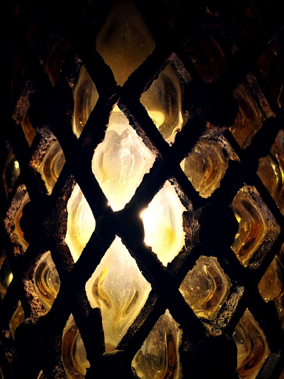 indoors, still life, large group of objects, table, high angle view, close-up, illuminated, metal, abundance, no people, arrangement, food and drink, variation, in a row, wood - material, order, selective focus, old-fashioned, home interior, choice