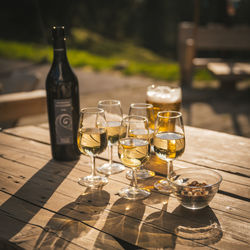 Glass of wine glasses on table