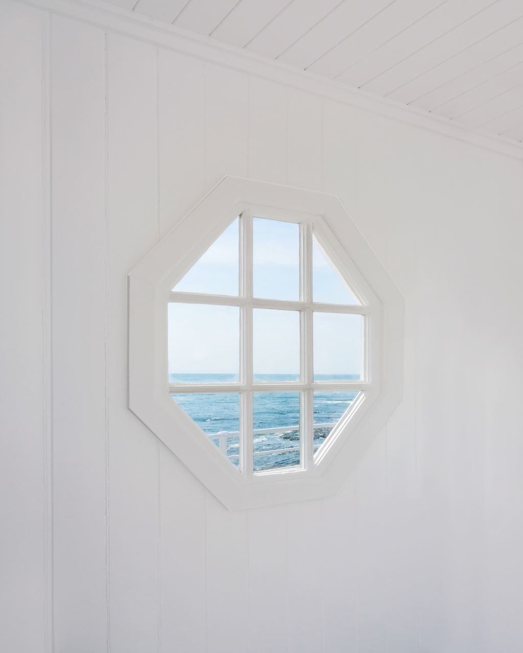 window, day, sea, architecture, glass - material, water, no people, nature, transparent, indoors, sky, built structure, white color, design, geometric shape, pattern, shape, horizon over water, window frame, ceiling