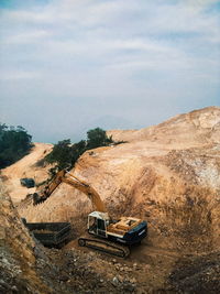 Panoramic shot of construction site against sky