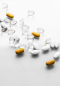 Close-up of pills on white background