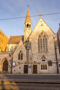 Low angle view of historic building against sky