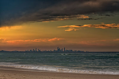 Scenic view of sea against cloudy sky