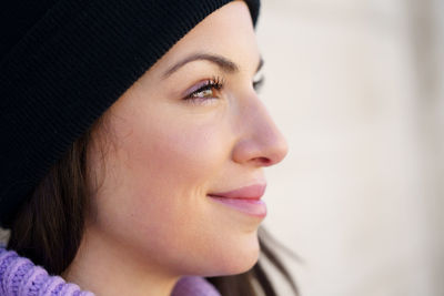 Close-up portrait of woman looking away