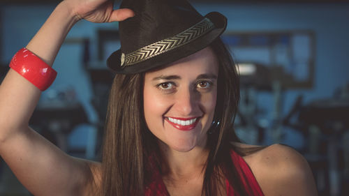 Portrait of a young woman wearing hat