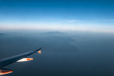 Aerial view of mountains against sky