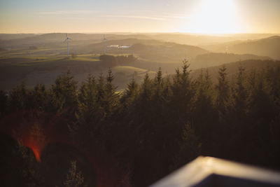 Scenic view of landscape against sky during sunset