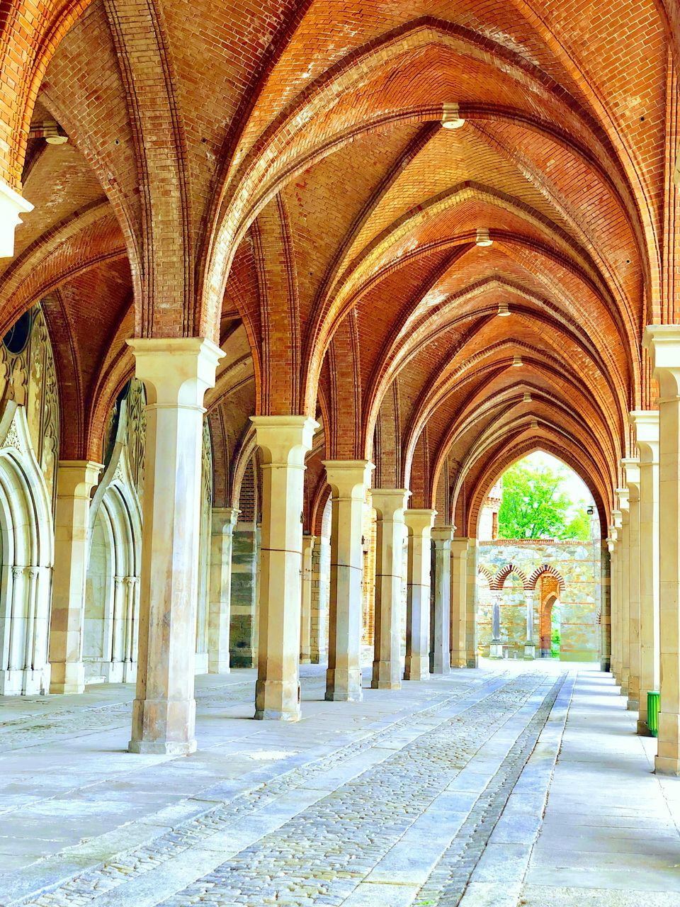 CORRIDOR OF BUILDING WITH COLONNADE