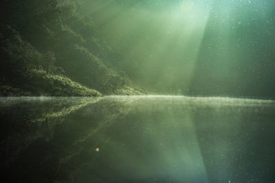 Sunlight streaming through lake