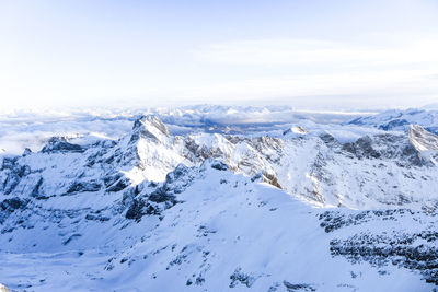 Scenic view of snowcapped mountains against sky