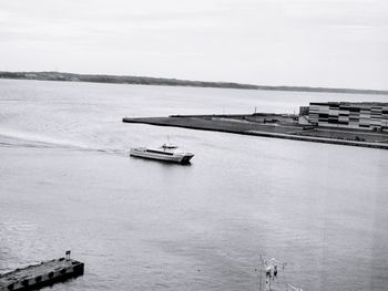 High angle view of sailboats in sea against sky