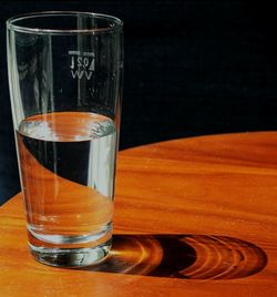 Close-up of beer glass on table