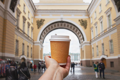 Cropped image of woman holding ice cream