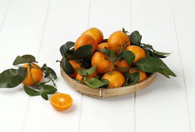 High angle view of fruits in plate on table