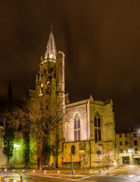 Illuminated buildings in city at night