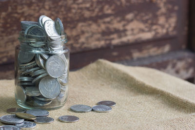 Close-up of coins on table