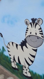 Close-up of animal representation against sky
